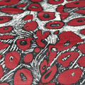 Close-up of fabric with red and black floral pattern