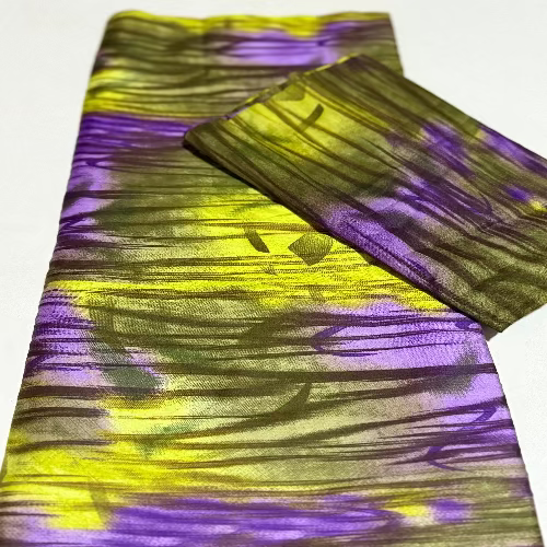 Purple and yellow fabric with abstract pattern on a white background
