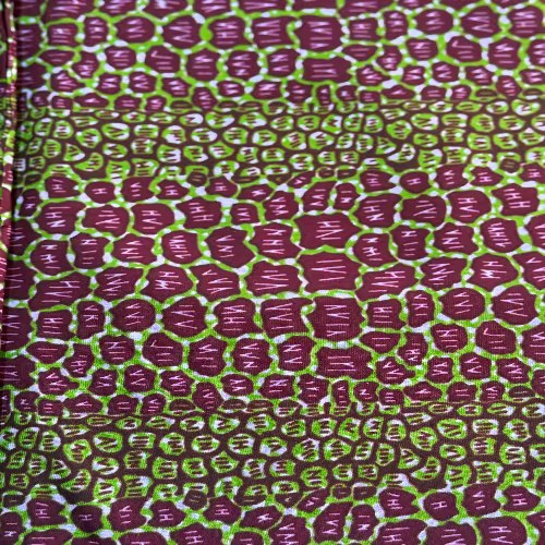 Patterned fabric with green and purple design