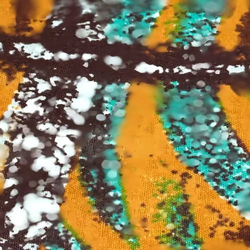 Close-up of a colorful abstract pattern with orange, black, and teal colors.