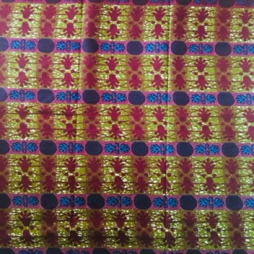 Colorful fabric with a pattern of people and flowers on a green background