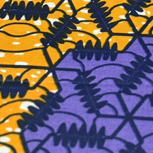 Close-up of fabric with purple and orange pattern