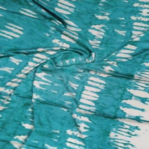 Teal fabric with white abstract pattern