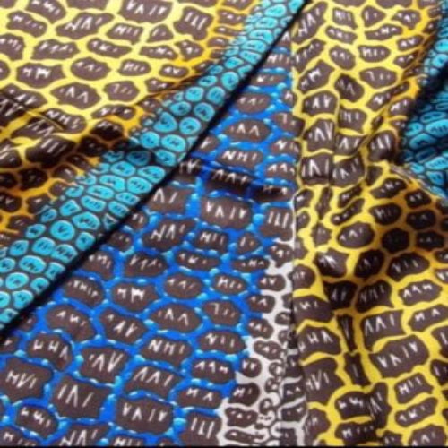Textured fabric with blue, yellow, and black patterns