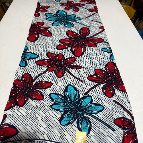 Floral fabric with red and blue flowers on a white background