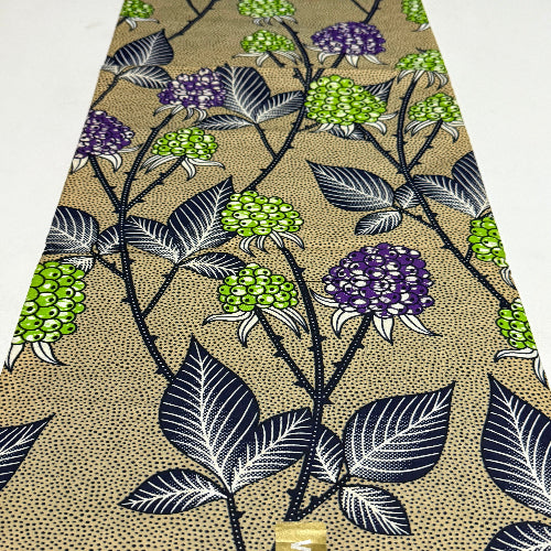 Fabric with floral and leaf pattern on a beige background