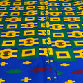 Colorful fabric with geometric pattern on a blue background