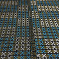 Patterned fabric with blue, black, and yellow design