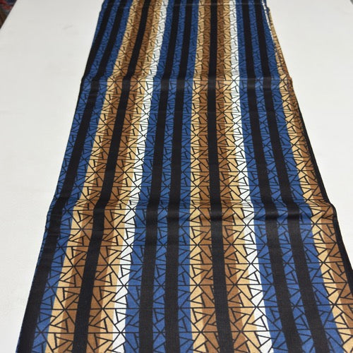 Striped fabric with blue, brown, and black pattern on a white background