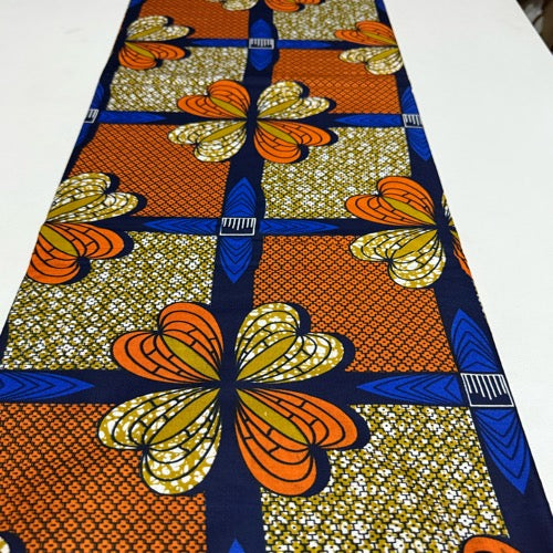 African print fabric with butterfly pattern on a white background