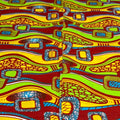 Colorful abstract patterned fabric with vibrant colors.