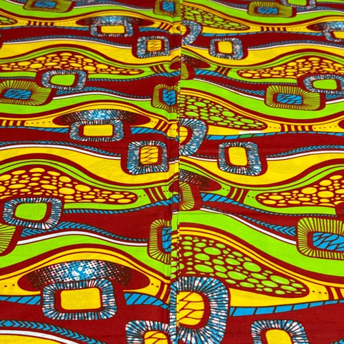Colorful abstract patterned fabric with vibrant colors.