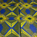Patterned fabric with blue and yellow geometric design
