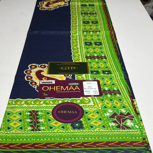Colorful fabric with green and blue patterns and 'OHEMAA' branding on a white background