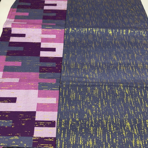 Two fabric samples with different patterns and colors side by side.