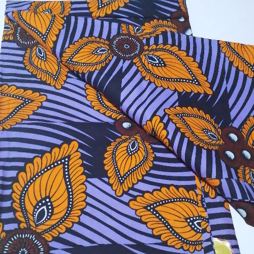 African print fabric with orange and purple pattern